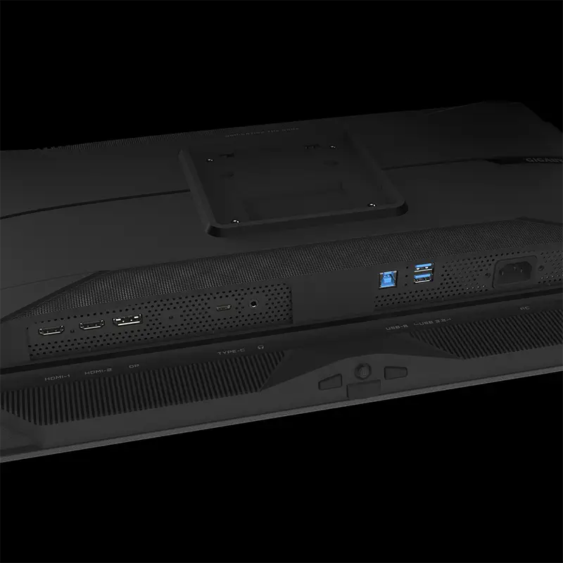 Vista inferior que muestra los conectores orientados hacia abajo: 2× HDMI 2.1, 1× DisplayPort 1.4, USB-C (Alt Mode + PD 18W), 2× USB-A 3.2, USB-B upstream, jack 3,5 mm y altavoces 5 W×2; incluye informe de calibración ΔE≤2. Puertos Gigabyte MO27Q2 27 pulgadas HDMI 2.1 DP 1.4 USB-C PD 18W KVM 240Hz