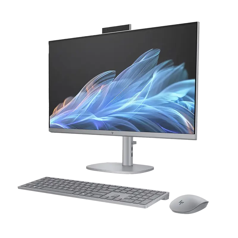 HP OmniStudio X 27-cs0272la desde la derecha mostrando cámara 5 MP inclinable con IR, puertos USB-C/USB-A laterales y acabado plata meteoro