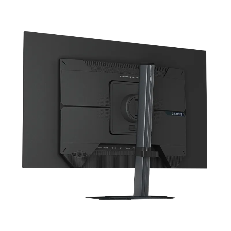 Vista lateral del monitor GIGABYTE MO27Q28G mostrando su perfil ultra delgado de 54.4 mm sin soporte, el brazo ergonómico con ajuste de altura de 130 mm, inclinación -5°~21°, giro ±15° y pivote 90° para máxima versatilidad.